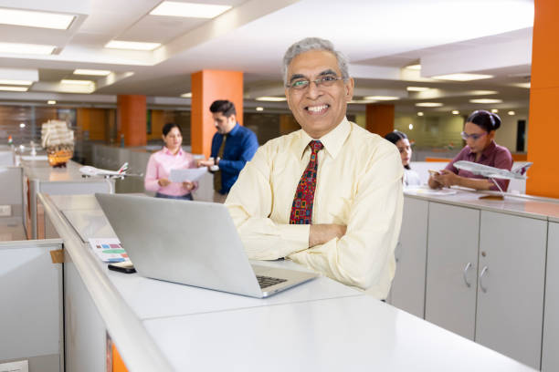 Hotel manager coordinating staff during a busy season