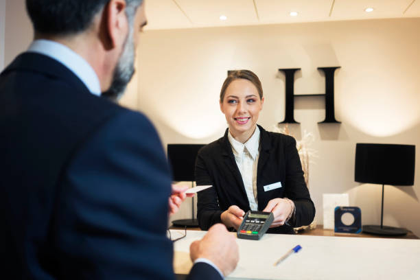 Modern hotel lobby with reception and comfortable guest seating